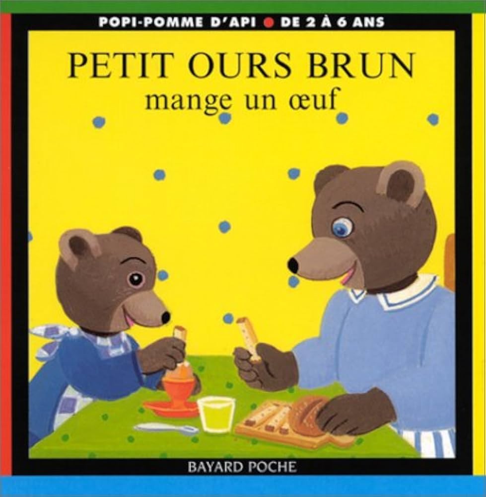 Petit ours brun mange un oeuf - Click to enlarge picture.